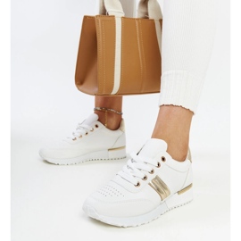 Zapatillas blancas y doradas con plataforma de goma Nihad. blanco 2