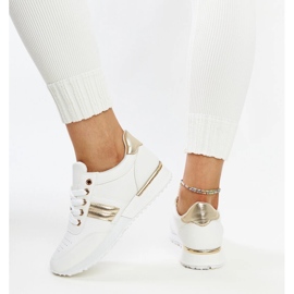 Zapatillas blancas y doradas con plataforma de goma Nihad. blanco 3