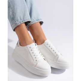 Zapatillas deportivas blancas de mujer. blanco 1