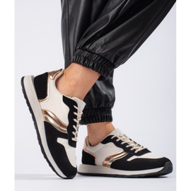 Zapatillas deportivas de mujer negras. negro 1