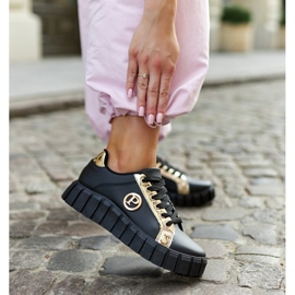Zapatillas negras y doradas con suela Bionda masiva. negro 2