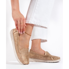 Mocasines dorados para mujer. 1