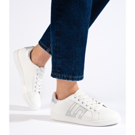 Zapatillas de mujer blancas y plateadas. blanco 2
