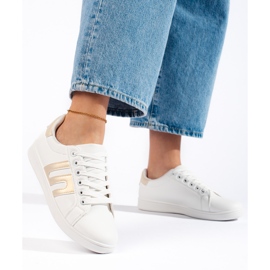 Zapatillas de mujer blancas y doradas. blanco 1