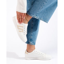 Zapatillas de mujer blancas y doradas. blanco 2