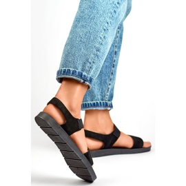 Sandalias de ante negro con banda elástica y suela plana. 2