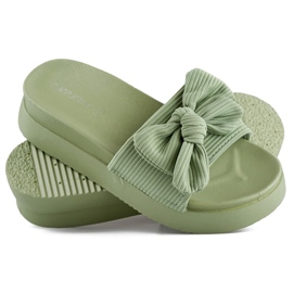 Zapatillas de mujer verde claro con lazo sobre suela gruesa. 2
