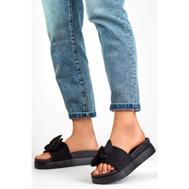 Zapatillas de mujer negras con lazo sobre suela gruesa. negro 2