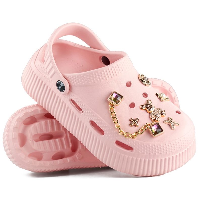 Chanclas rosas con suela gruesa y adornos. 1