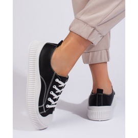 Deportivas negras de mujer fabricadas en piel ecológica. negro 1