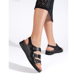 Sandalias de mujer negras con hebillas. negro 1