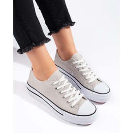 Zapatillas clásicas de mujer grises. 1