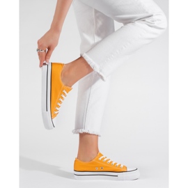 Zapatillas clásicas amarillas con cordones para mujer. amarillo 3