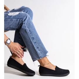 Zapatillas slip-on de tejido Shadhi en negro 1