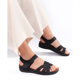 Sandalias de mujer celestes con cuña baja. azul 2