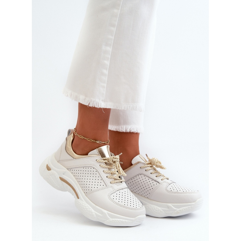 Zapatillas de mujer de piel con suela gruesa Dzumati blanco y dorado 1