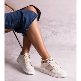 Deportivas beige decoradas con pedrería Xarles 1