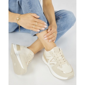 Zapatillas cómodas de mujer beige. 2