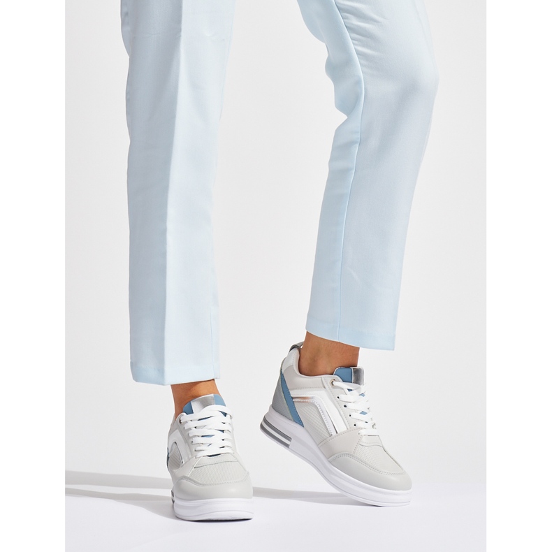 Deportivas de mujer grises con cuña oculta. 2