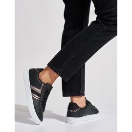 Zapatos deportivos cómodos negros. 3