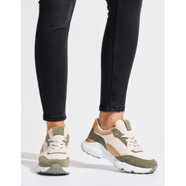 Zapatillas verdes de mujer. 1