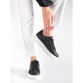 Zapatillas negras en la plataforma negro 2