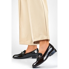 Zapatos clásicos de mujer charol negro. 3