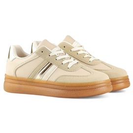 Deportivas de mujer beige con suela beige. 1