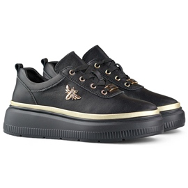 Deportivas mujer de piel en color negro con complementos dorados. 1 Deportivas mujer de piel en color negro con complementos dorados. 1