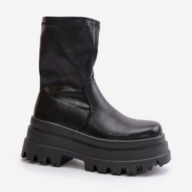 Botines Florinara negros sobre plataforma maciza. 10