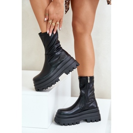Botines Florinara negros sobre plataforma maciza. 13
