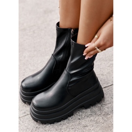 Botines Florinara negros sobre plataforma maciza. 5