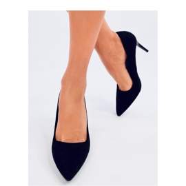 Tacones altos de ante negro. 3