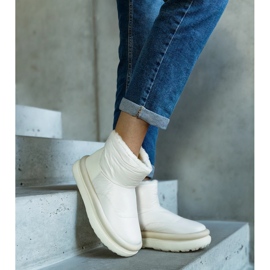 Botas de nieve cálidas beige con plataforma Cores. 1