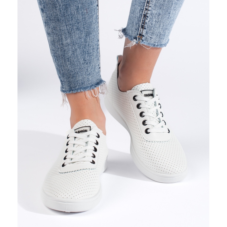 Zapatillas blancas clásicas de mujer. blanco 1
