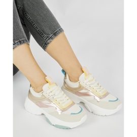 Calzado deportivo de mujer con suela gruesa. dorado 1