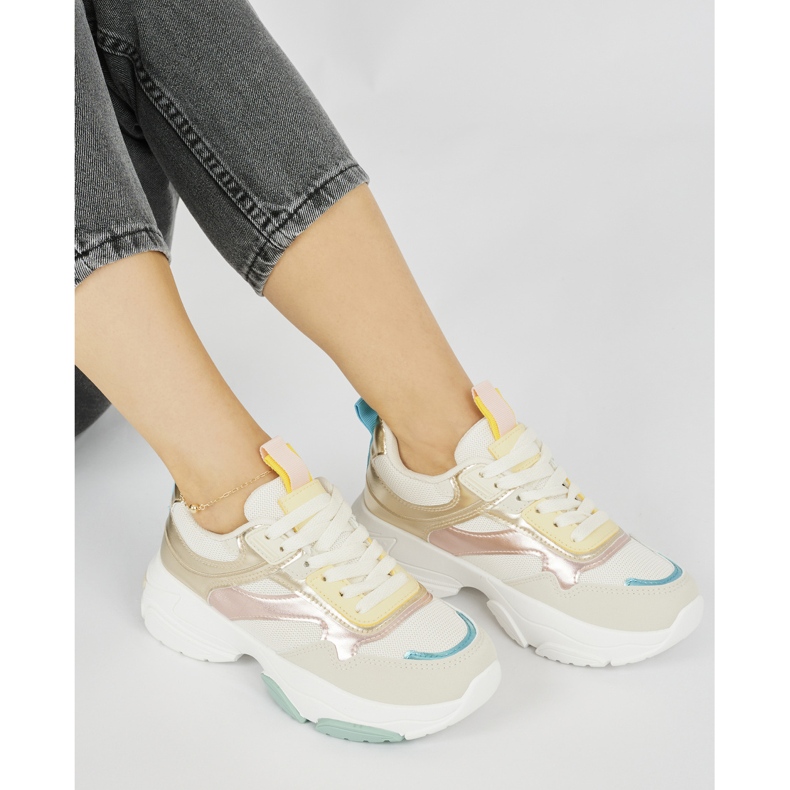 Calzado deportivo de mujer con suela gruesa. dorado 1