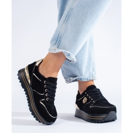 Zapatillas negras de mujer en la plataforma. negro 1