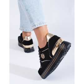 Zapatillas negras de mujer en la plataforma. negro 3