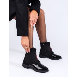 Botines negros clásicos con tacón plano 1