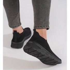 Zapatos deportivos negros para mujer. 2