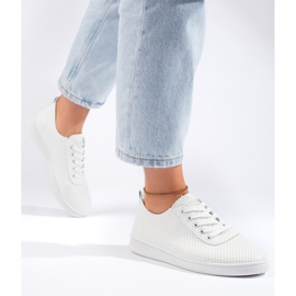 Zapatillas blancas clásicas de mujer. blanco 1