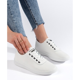Zapatillas blancas clásicas de mujer. blanco 3