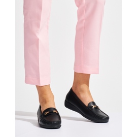 Mocasines de mujer negros con decoración. 1