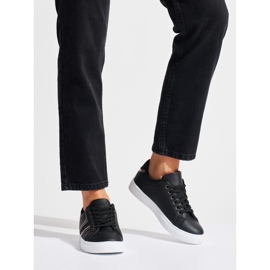 Zapatos deportivos cómodos negros. 2