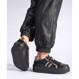 Zapatillas de piel con plataforma negra. negro 2