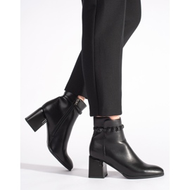 Botines negros elegantes de mujer. 1