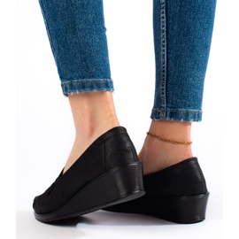 Mocasines negros de mujer. 4
