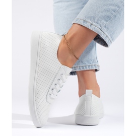 Zapatillas blancas clásicas de mujer. blanco 3
