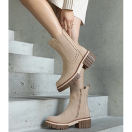 Botas de plataforma masivas de color beige claro con abrasiones de Sholla 2
